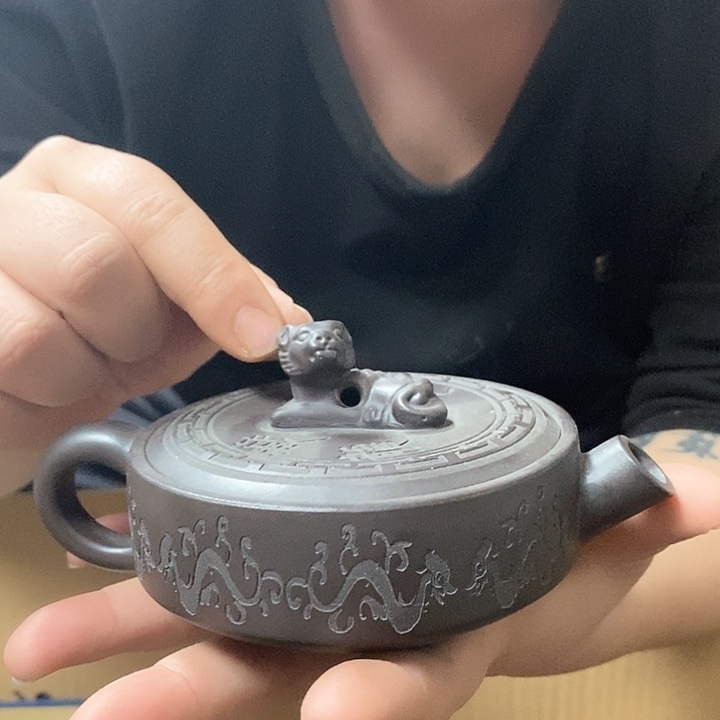 紫砂茶壶仍然让他柔软