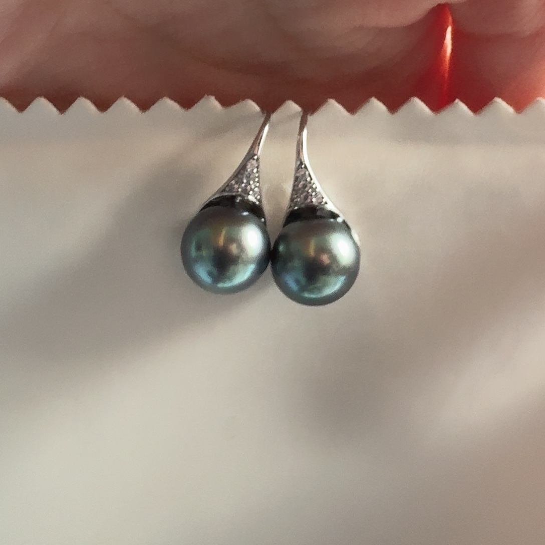 悠***山海水珍珠耳饰银S925镶嵌10.5mm