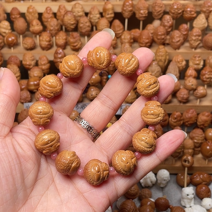 橄榄核吊坠短圆辛巴手串