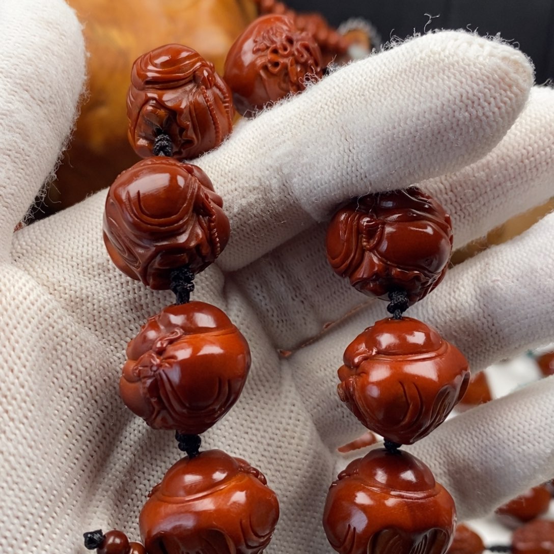 橄榄核手串李*生我想知道