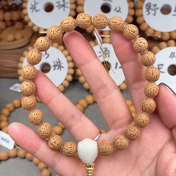 桃核手串宽脐小金豆9.5-2尺寸误差0.5之间