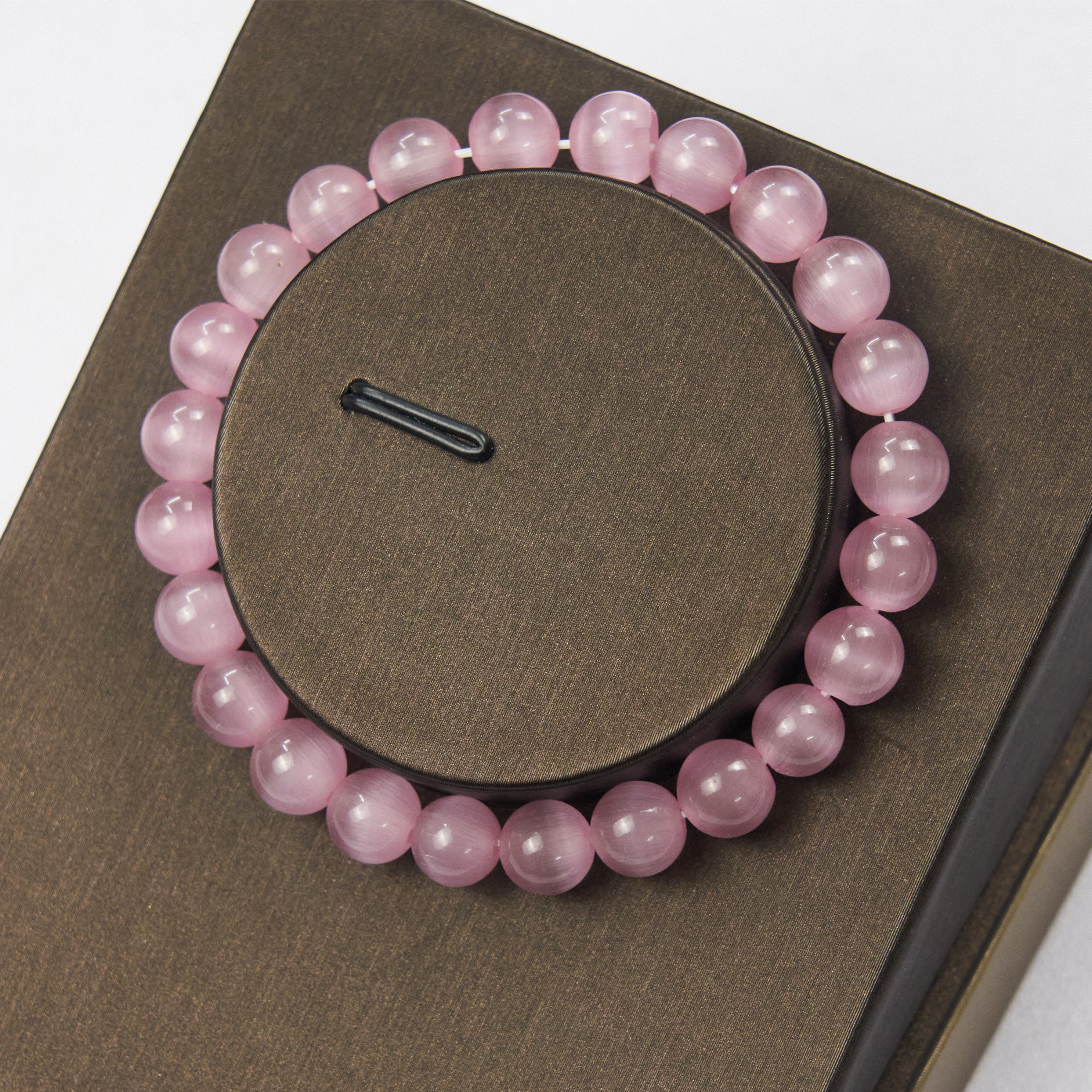 【金展珠宝】粉色猫眼珠单圈手串