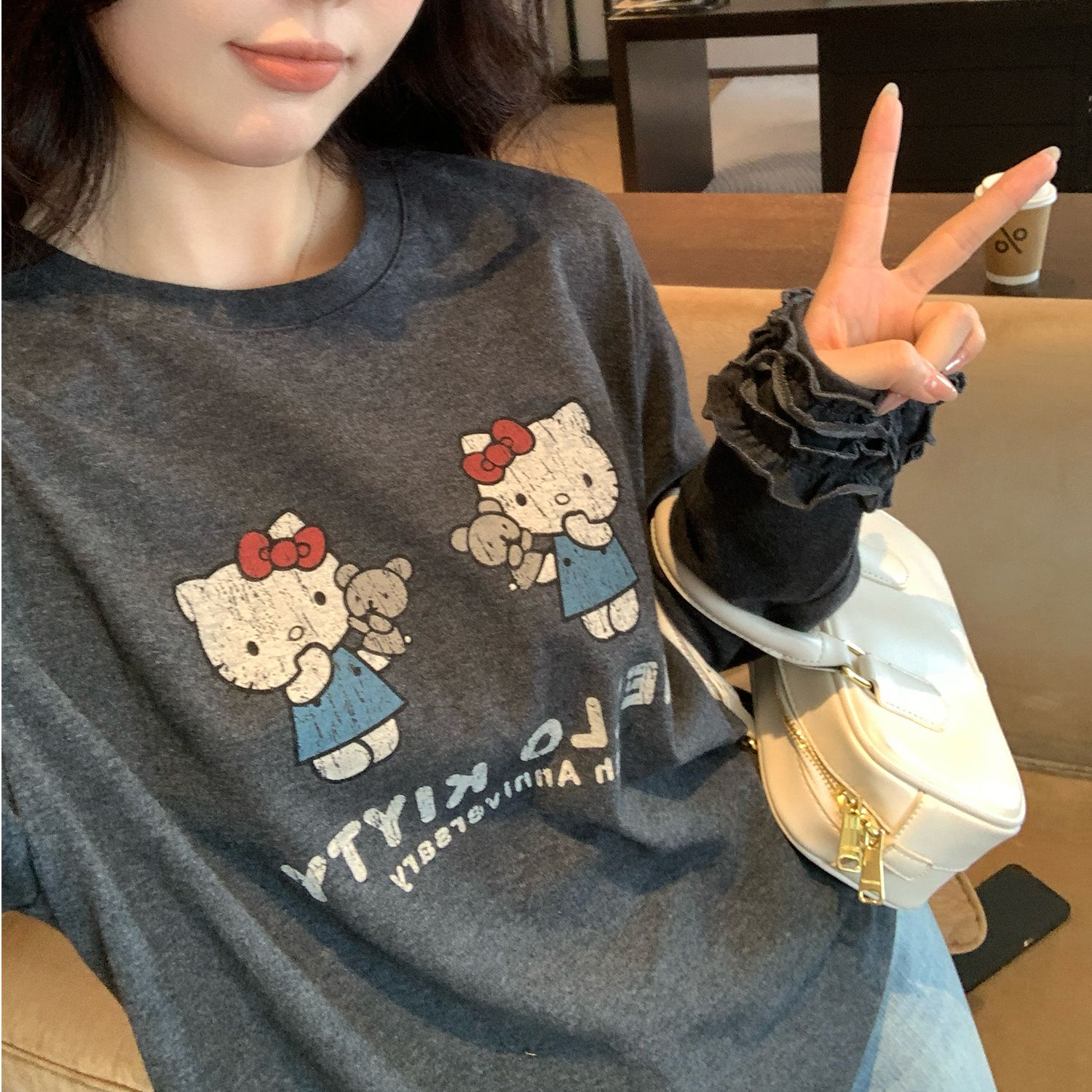 黑灰色圆领假两件拼接T恤女秋新款宽松显瘦减龄卡通猫咪长袖上衣