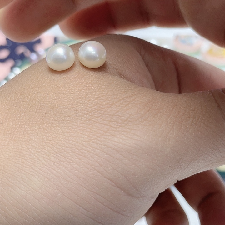 墨***儿淡水珍珠银S925镶嵌耳饰