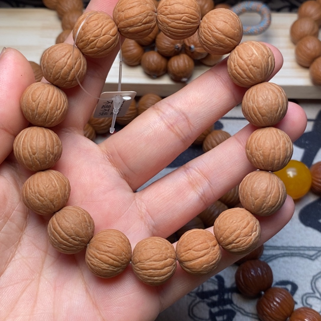 吊坠桃核原皮凤羽