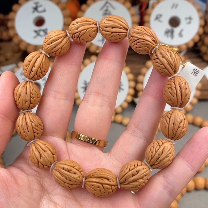 桃核手串千***?钱袋13花脐尺寸误差0.5