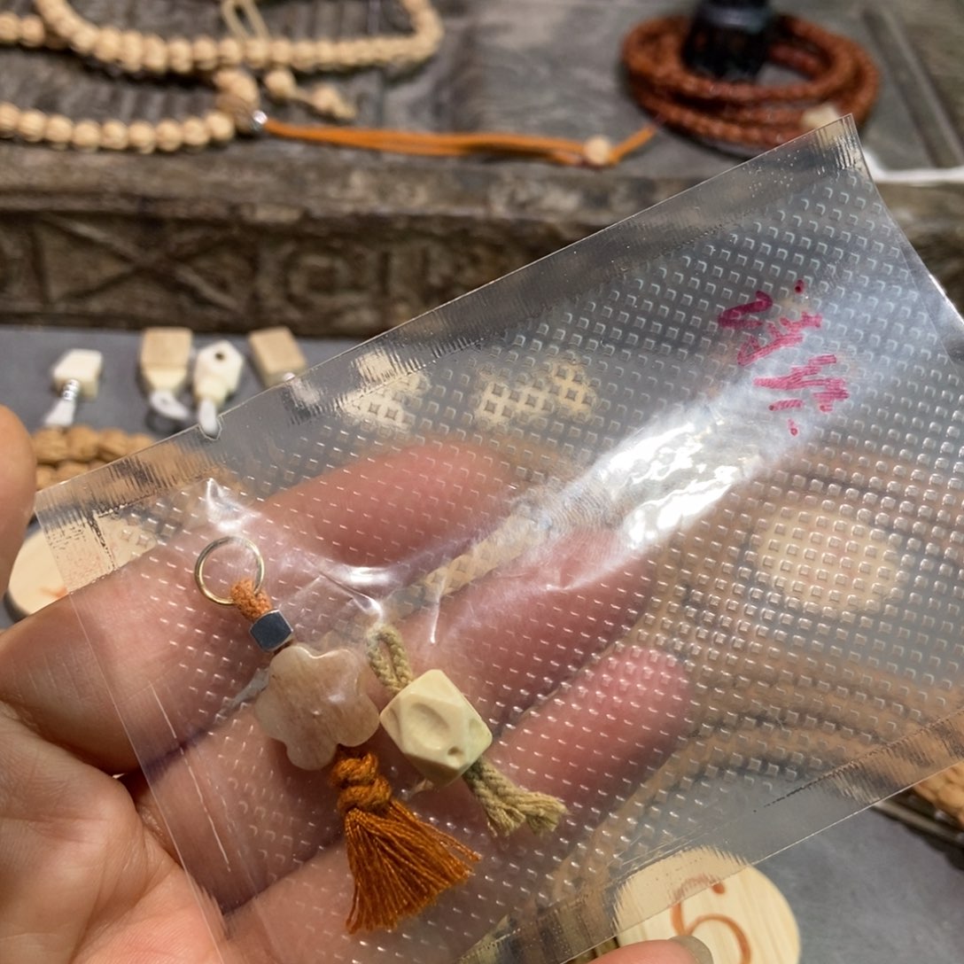 诗***织柏香籽/百香籽吊坠