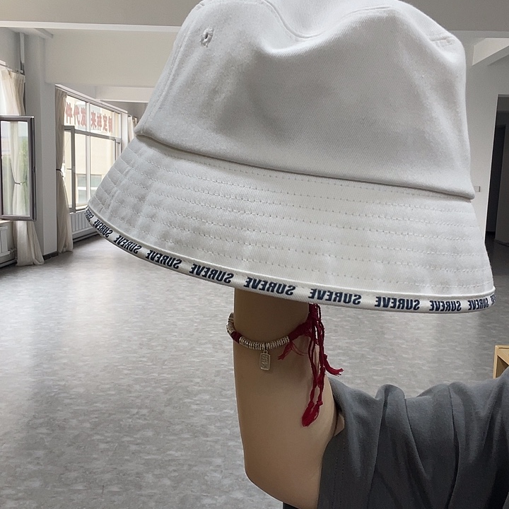 头层牛皮革白色渔夫帽周边有字母