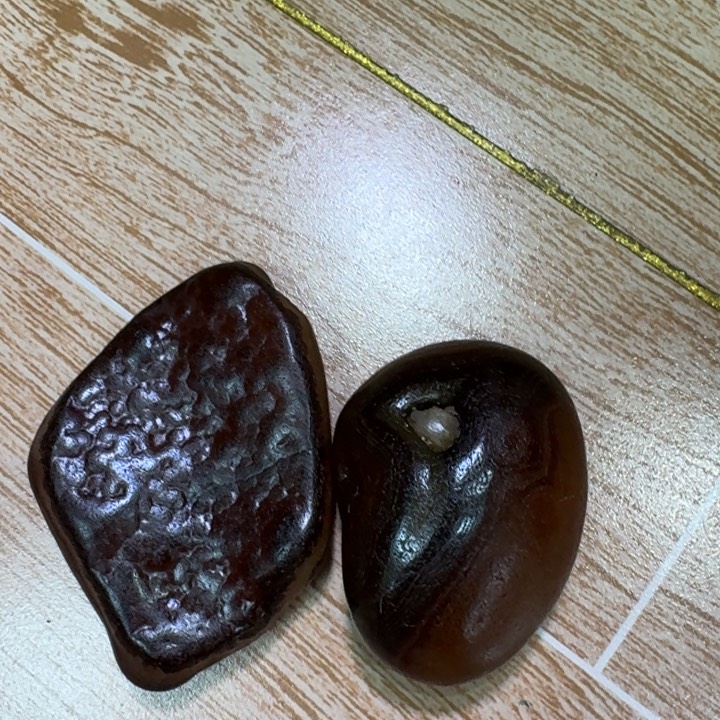 砖雕小*头马达加斯加奇石手把件