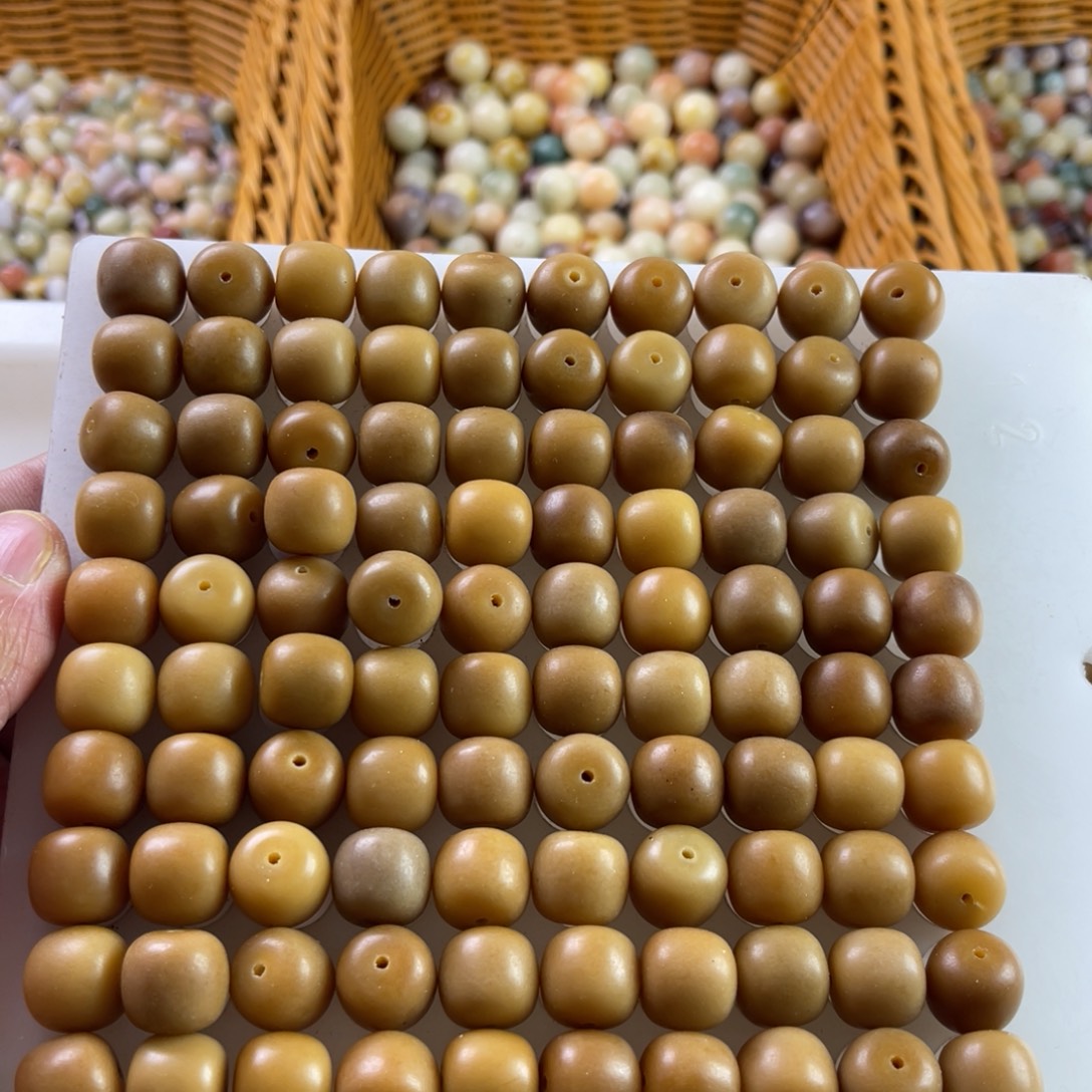 瑶****白玉菩提吊坠13-12风化桶珠100