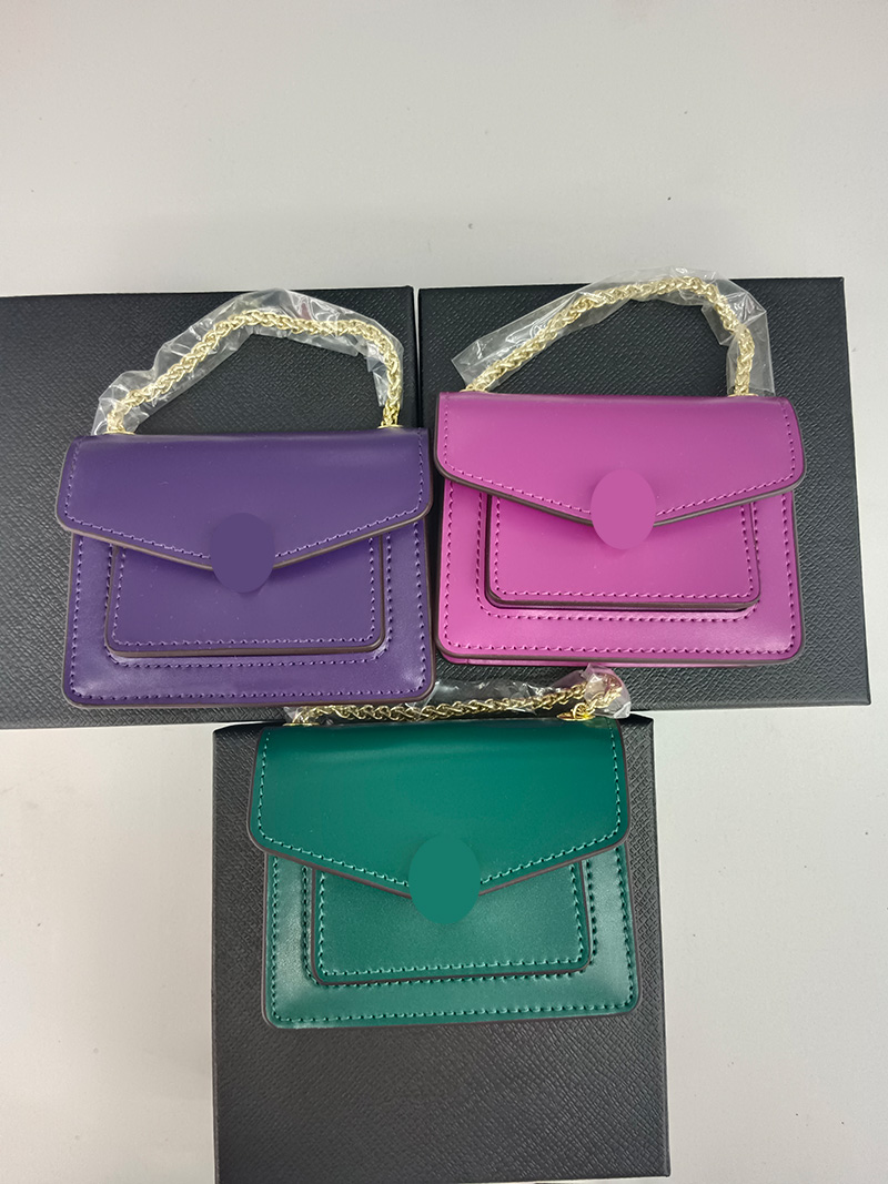 2025新款女士蛇头时尚简约小手拿包口红包