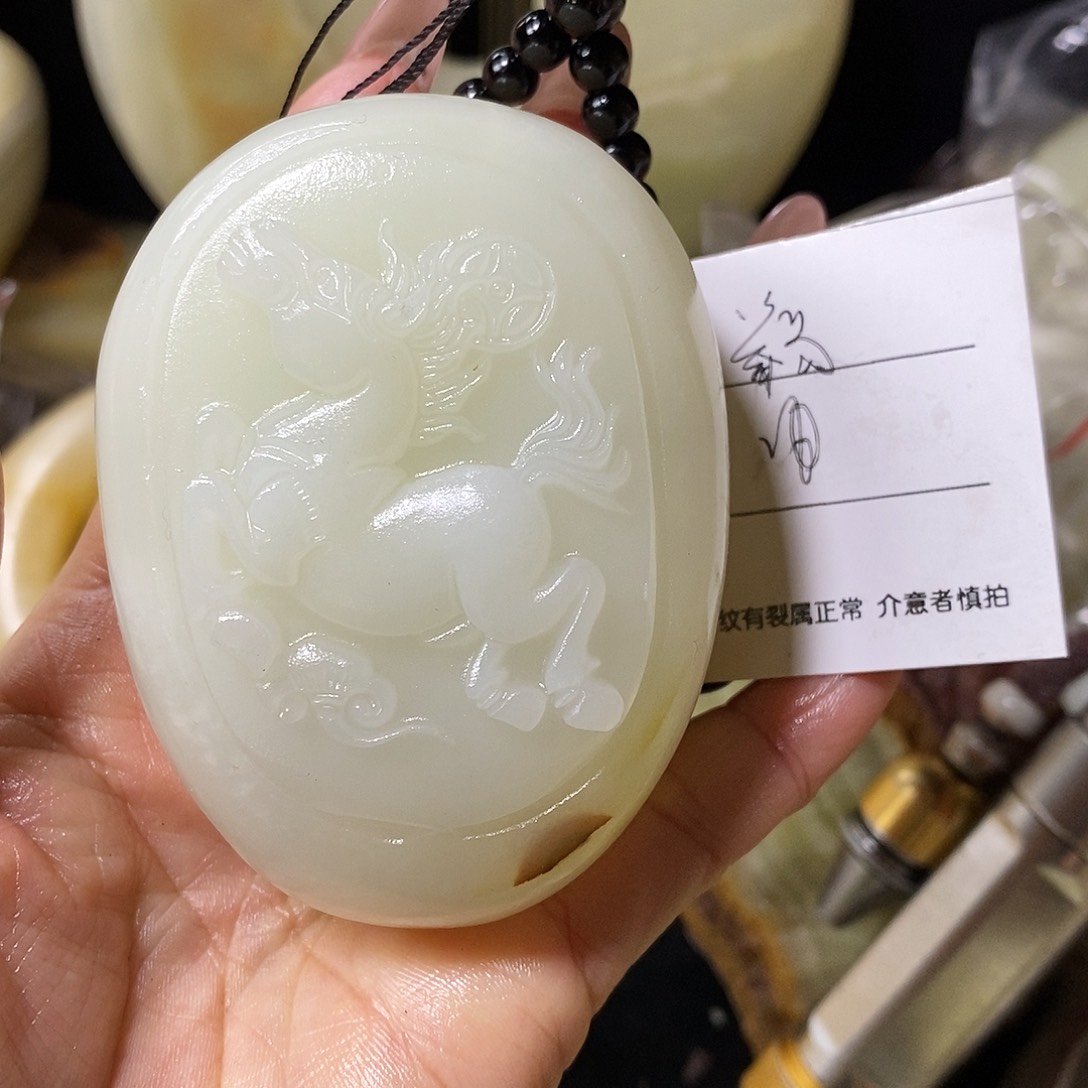 石材举*古青石手把件