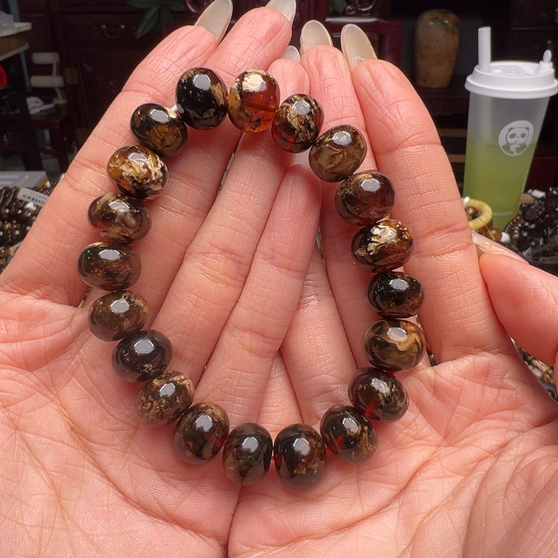 琥珀裸石未镶嵌抚顺琥珀20011-2。12mm