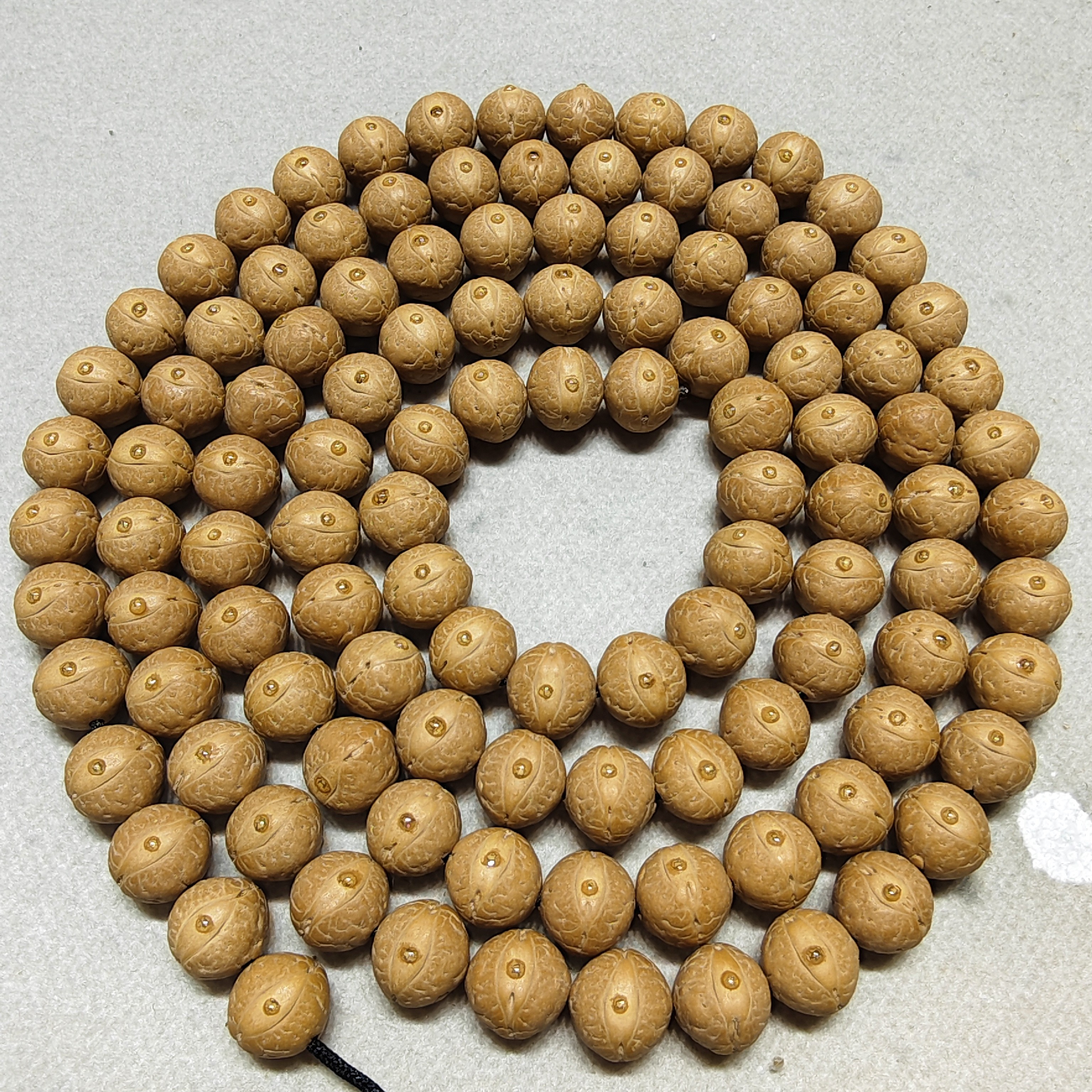 12mm尼泊尔凤眼菩提实心飞碟桩108