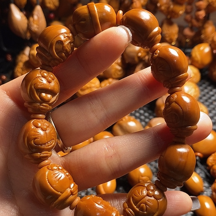 吊坠橄榄核豆*生机器猫