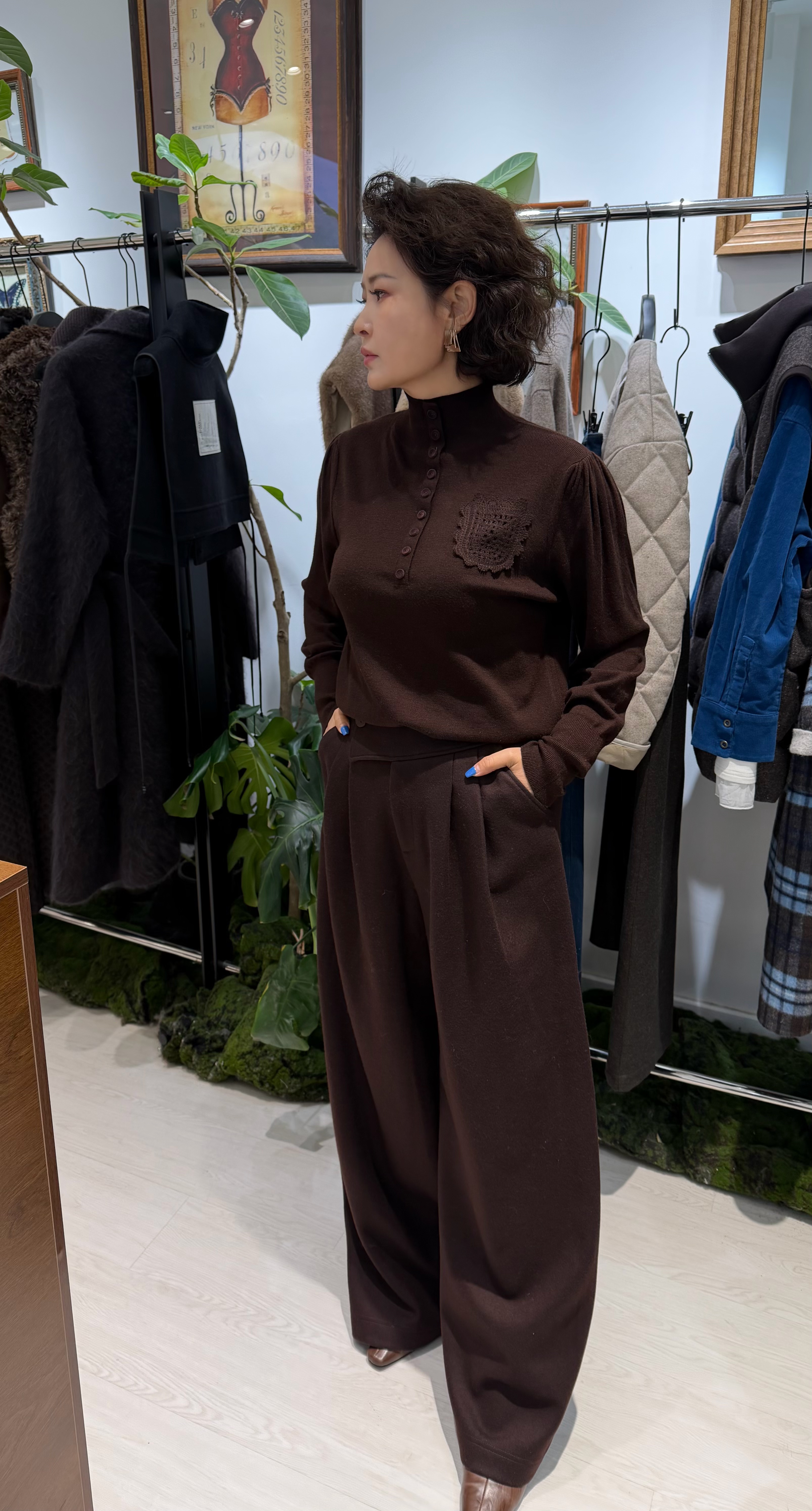 冬季洋气钩花单口袋泡泡袖绵羊毛针织衫女宽松百搭毛衣