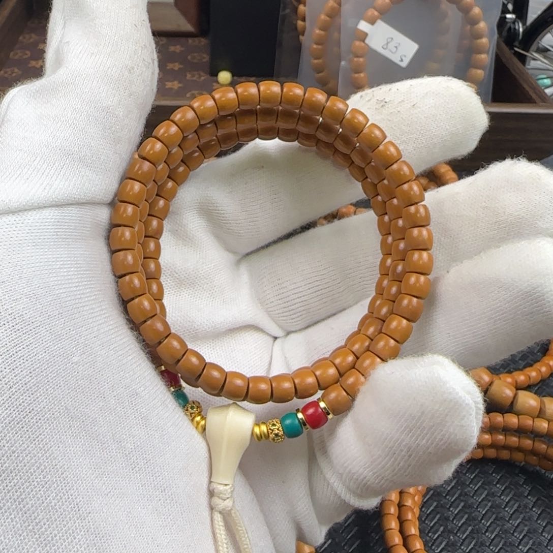 橄榄核吊坠6.0mm老挝核尖直切110颗全无白