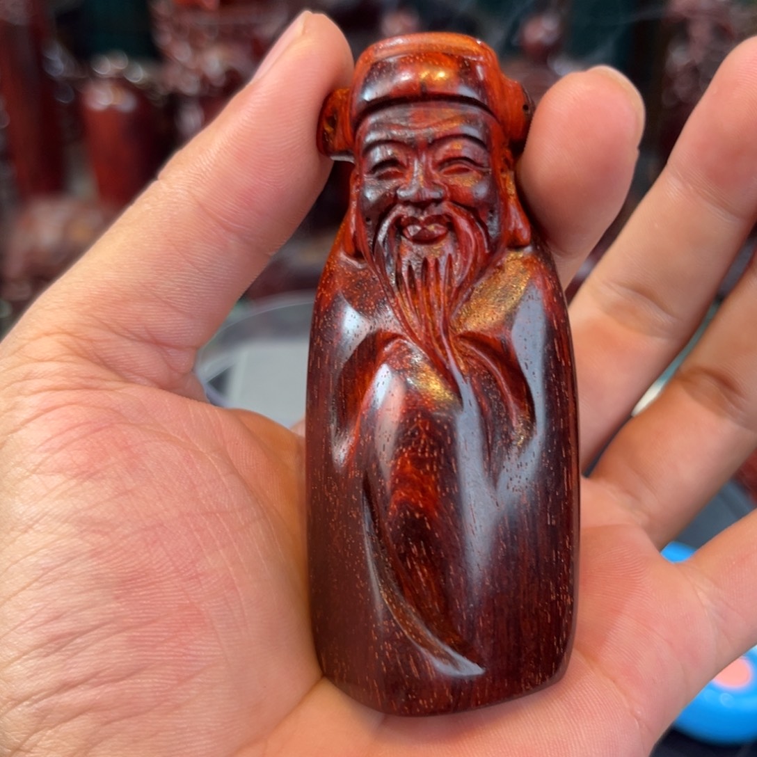 麟***座印度小叶紫檀手把件