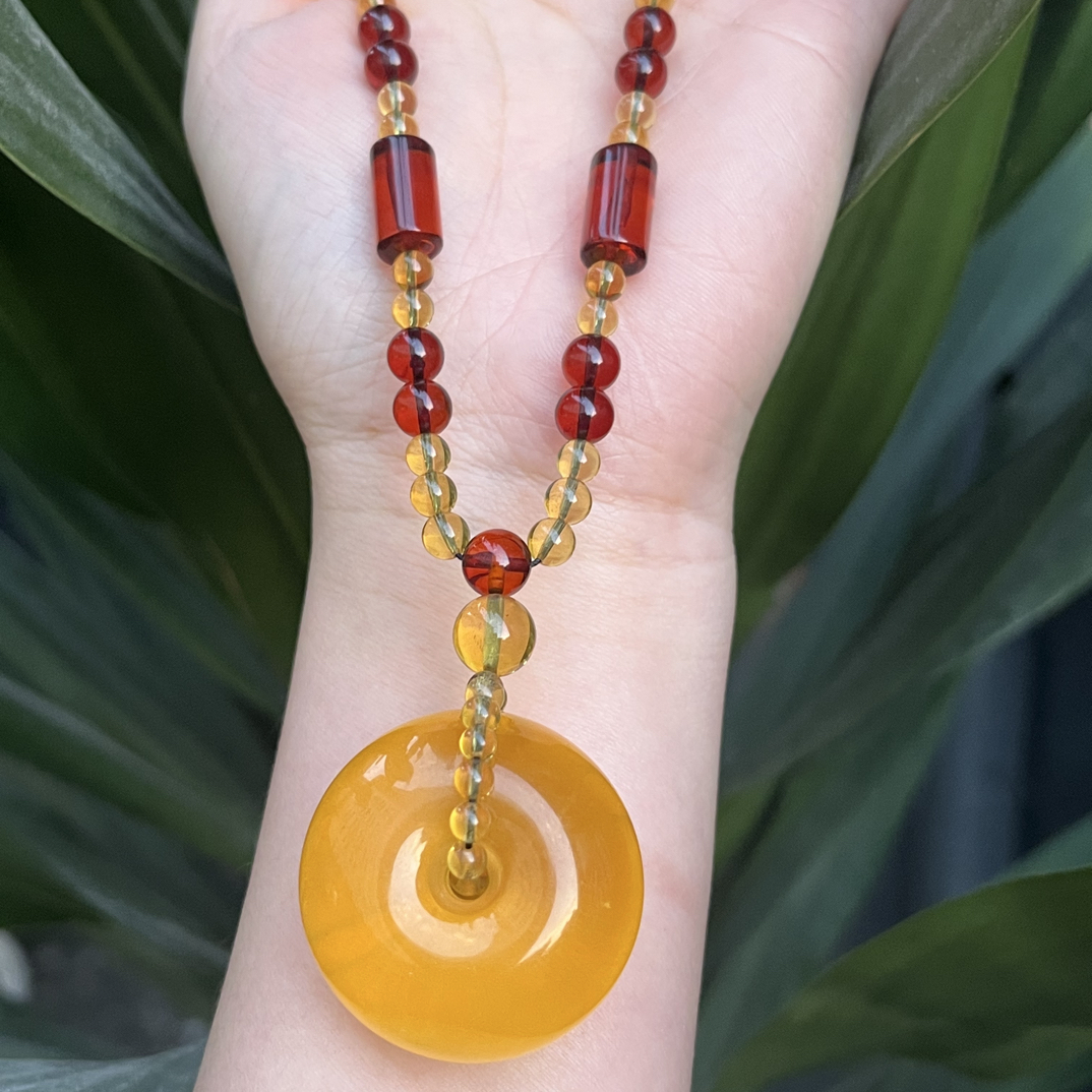 琥珀金绞蜜蜡平安扣吊坠，一套31g，36*21.8mm，天然原矿保真