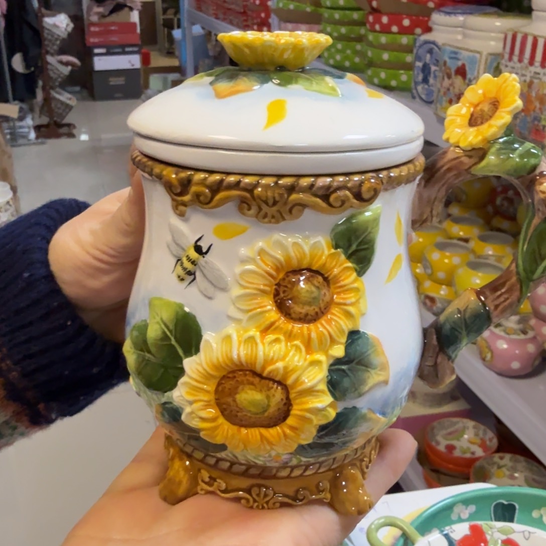 瓷向日葵重工浮雕茶介杯1只