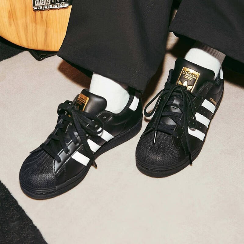 【大明宫AD专享】三叶草男女金标贝壳头黑色休闲情侣鞋EG4959