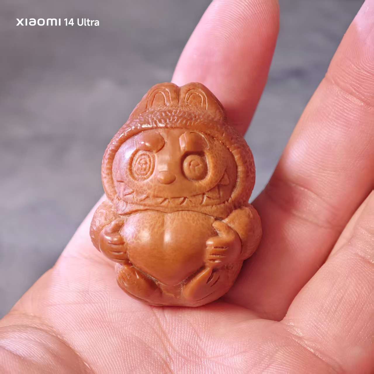 橄榄核雕刻 拉布布把件