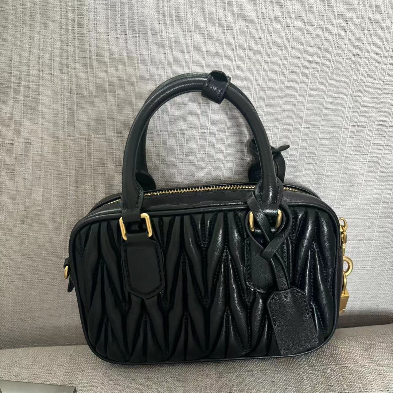 MM黑色羊皮波士顿手提包斜跨