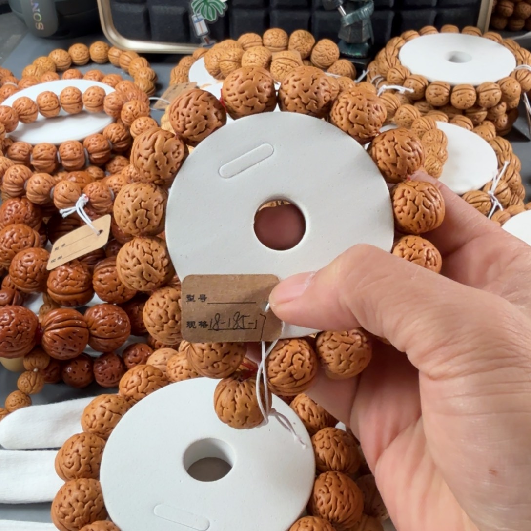 阳***～桃核手串18盘锦肌肉纹S