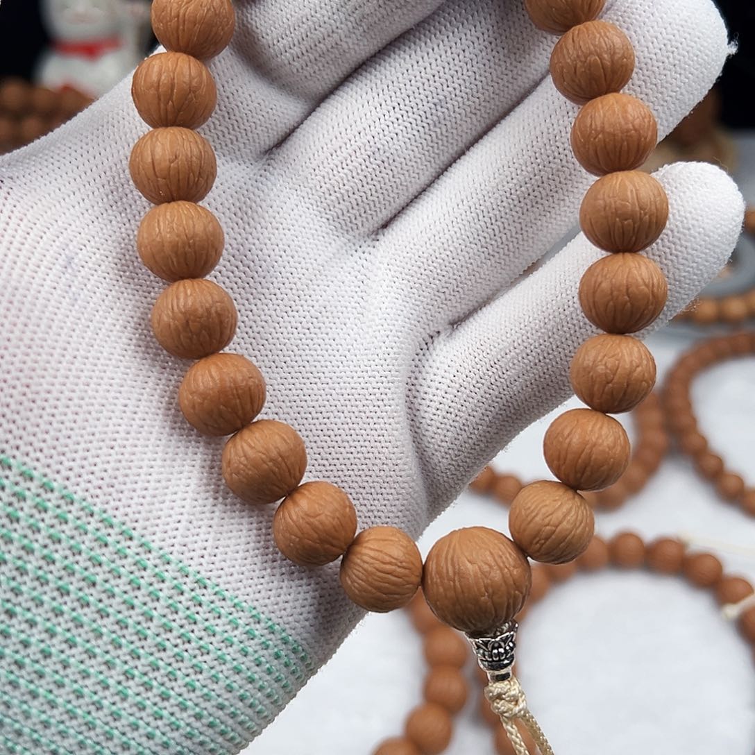 独***智猴头核桃手串凤羽