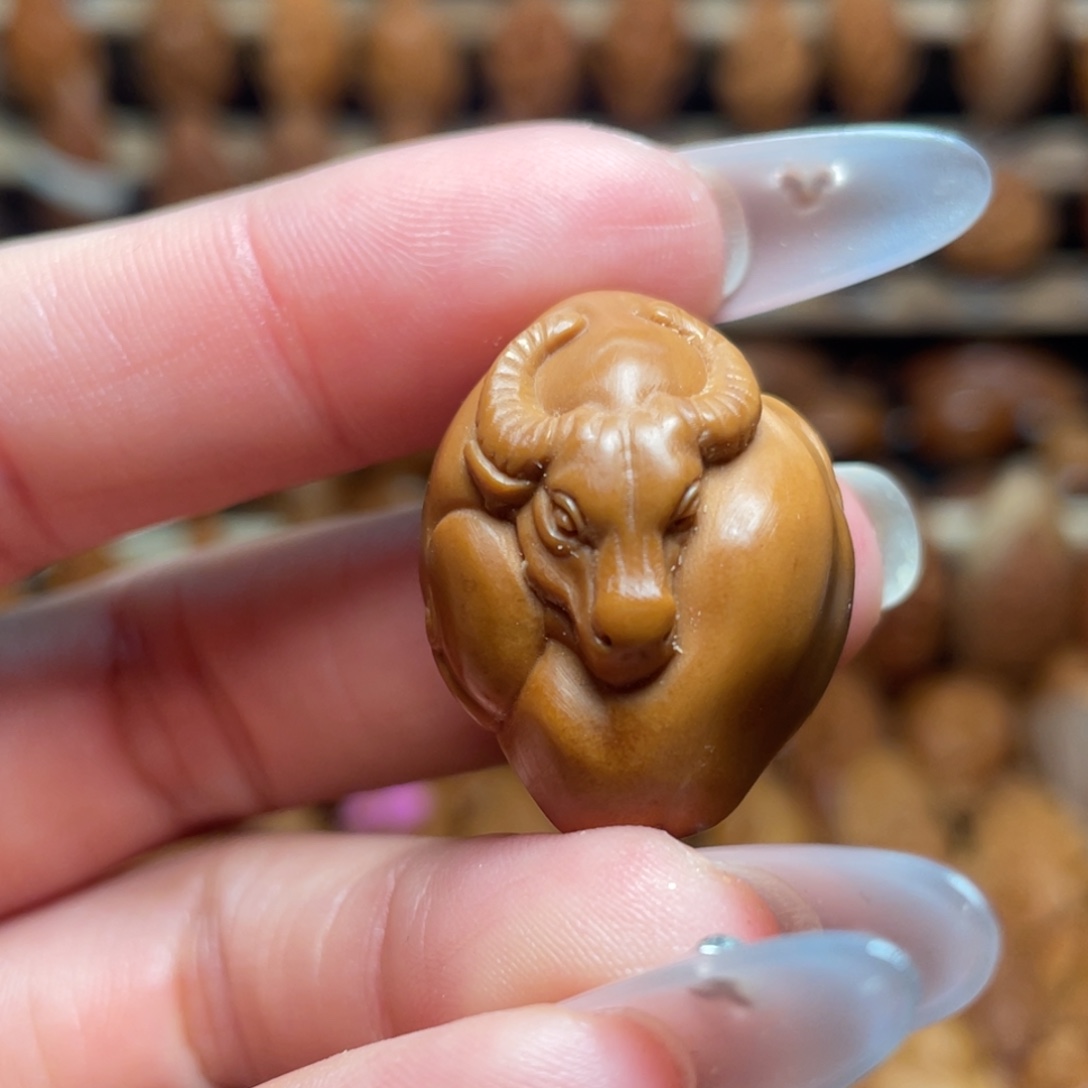 橄榄核把件扭转乾坤