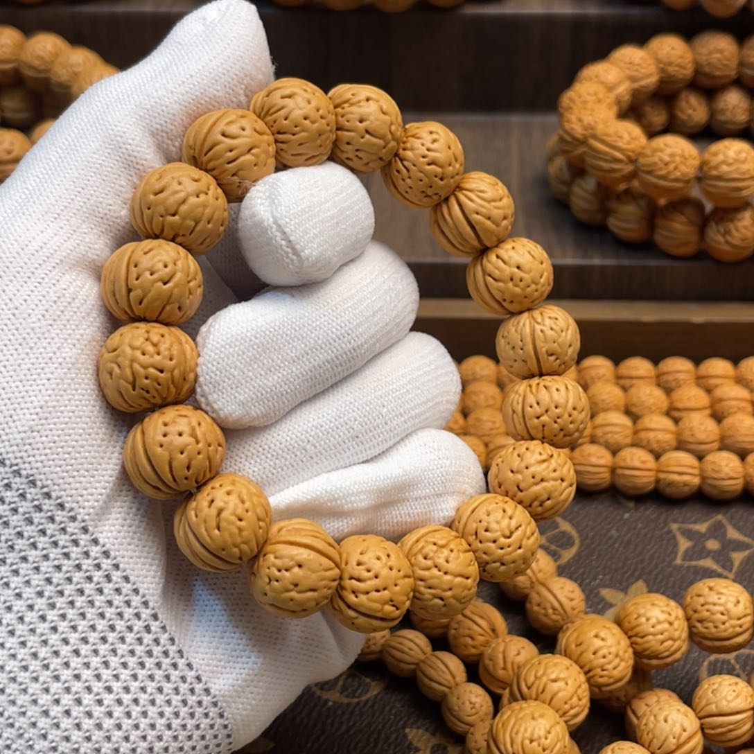 手串桃核挪**林金丹手串