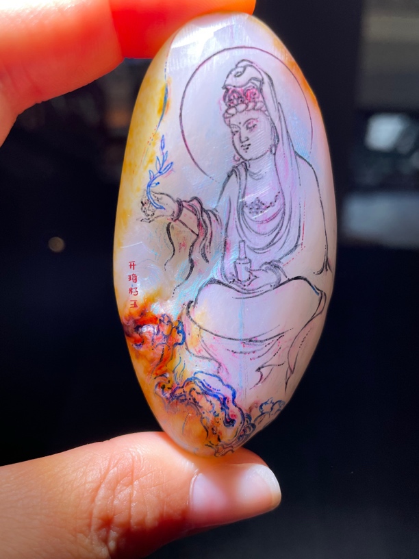文殊菩萨和田玉雕刻设计红皮白肉独籽