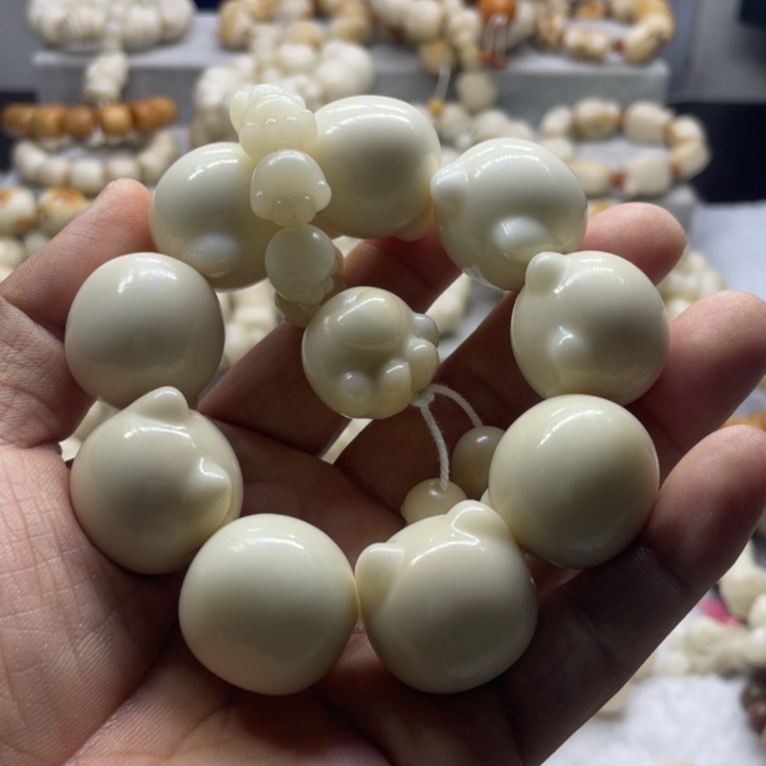 吊坠菩提根/象牙果全品象牙果猫头手串卡25