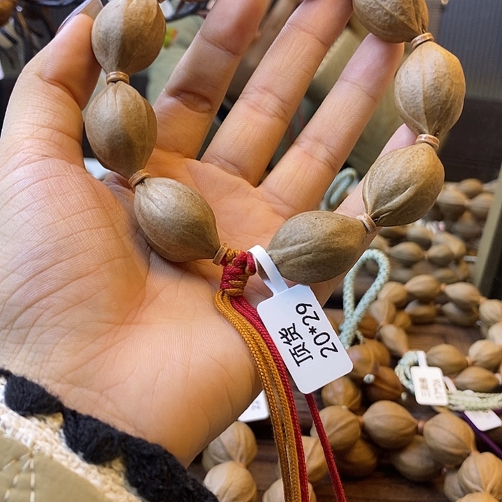 张***宇橄榄核吊坠梅林铁核