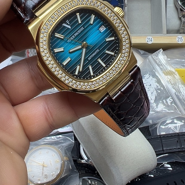 全自动机械金表一个