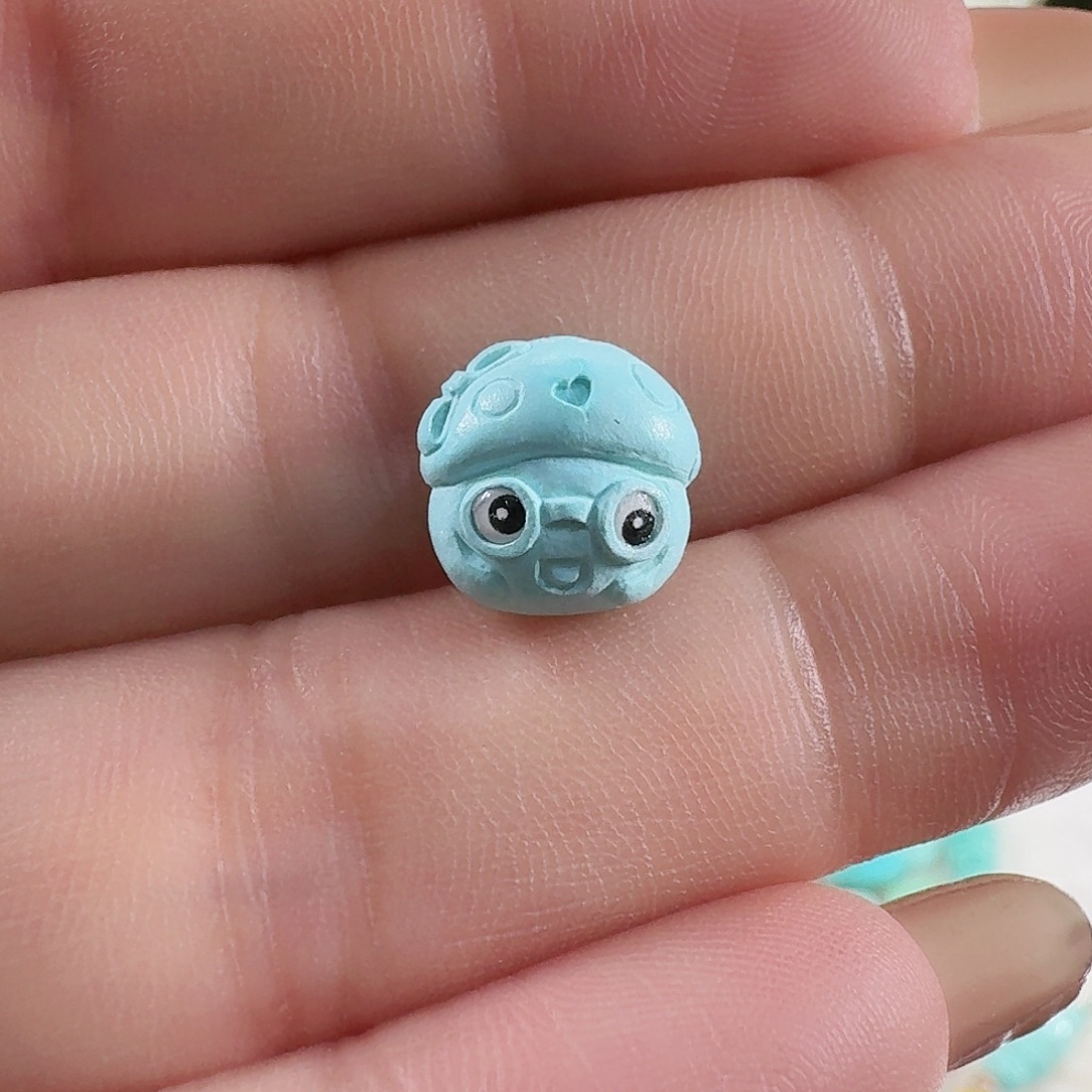 柚***一绿松石未镶嵌颈饰