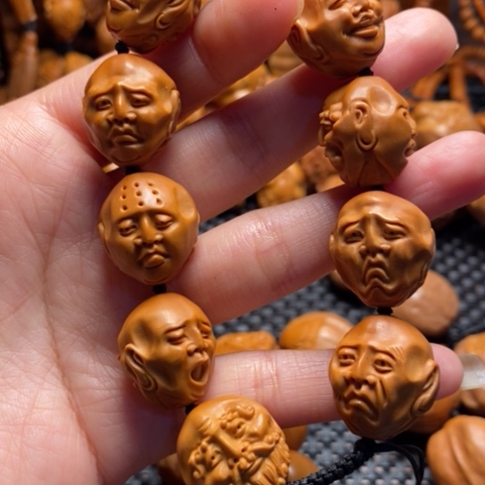 橄榄核吊坠老须派