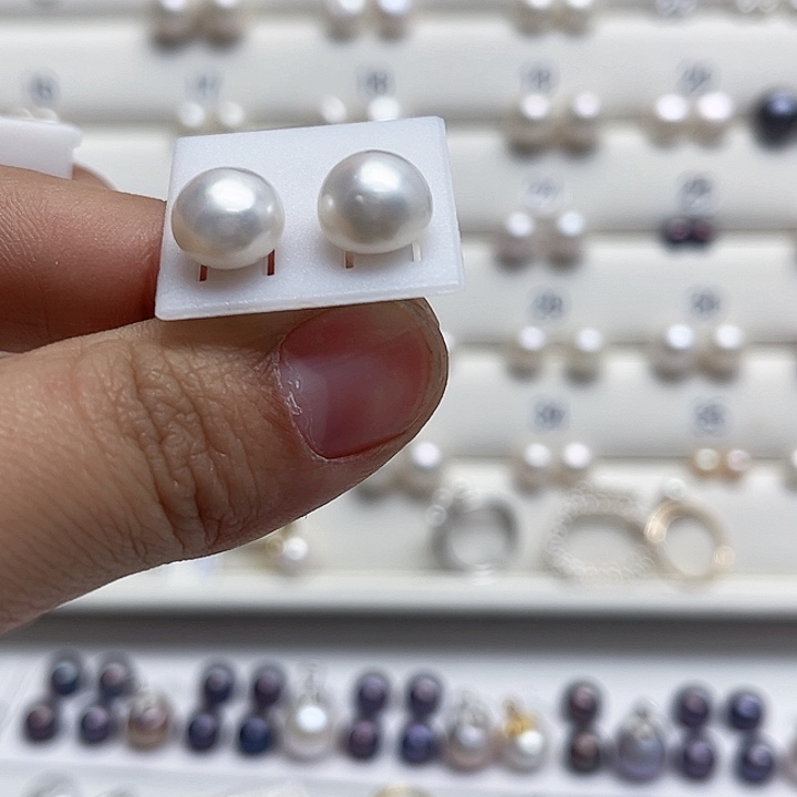 跃***洋耳饰银S925镶嵌淡水珍珠