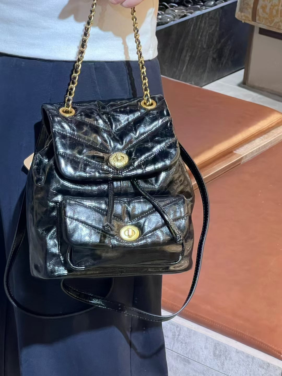 食草堂油蜡牛皮链条双肩包