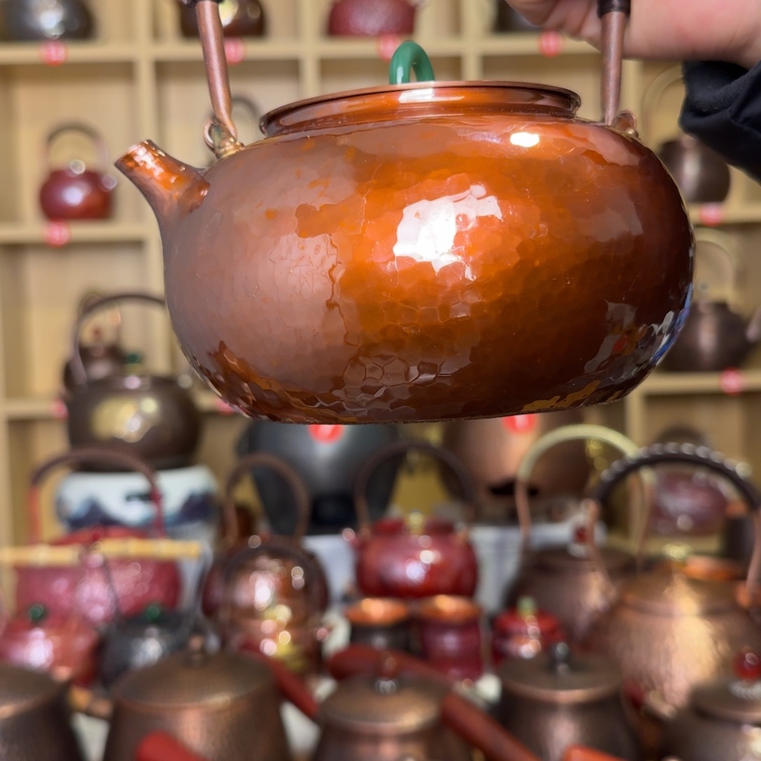 烤色紫铜提梁壶了