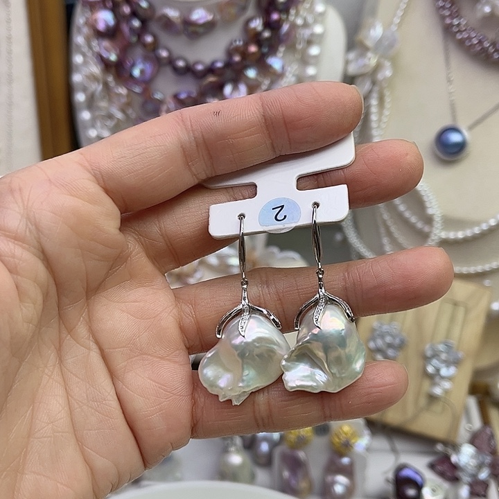 曾***美淡水珍珠未镶嵌耳饰