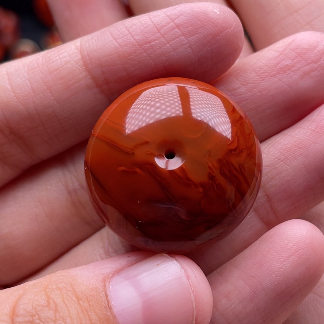 沐***行南红玛瑙未镶嵌珠宝奇石平安扣吊坠