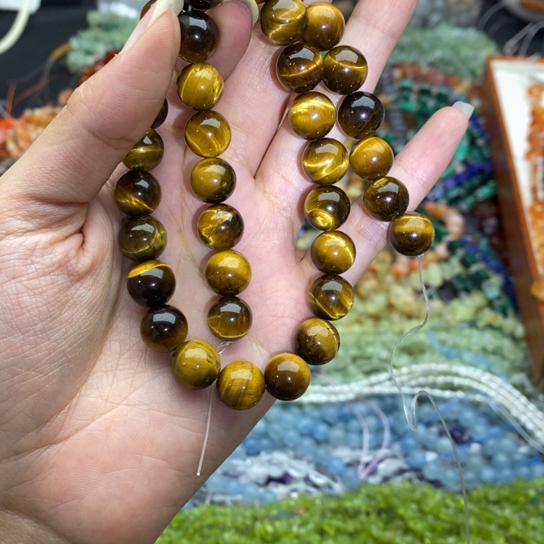 玛瑙/玉髓未镶嵌珠宝半成品一条天然黄虎石圆珠10mm高品