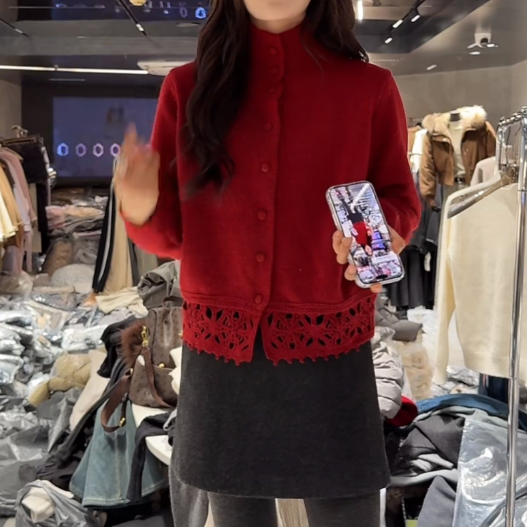 设计感轻奢勾花镂空针织开衫女2025冬季新款百搭纯色立领长袖毛衣