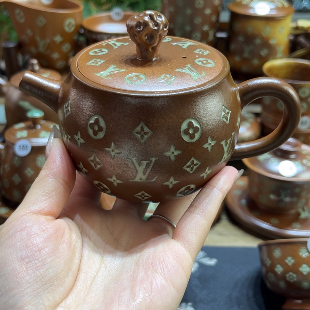 金***。草木灰老花手工壶