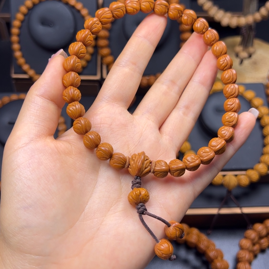 大***烟手串桃核野生玉龙脊0.9