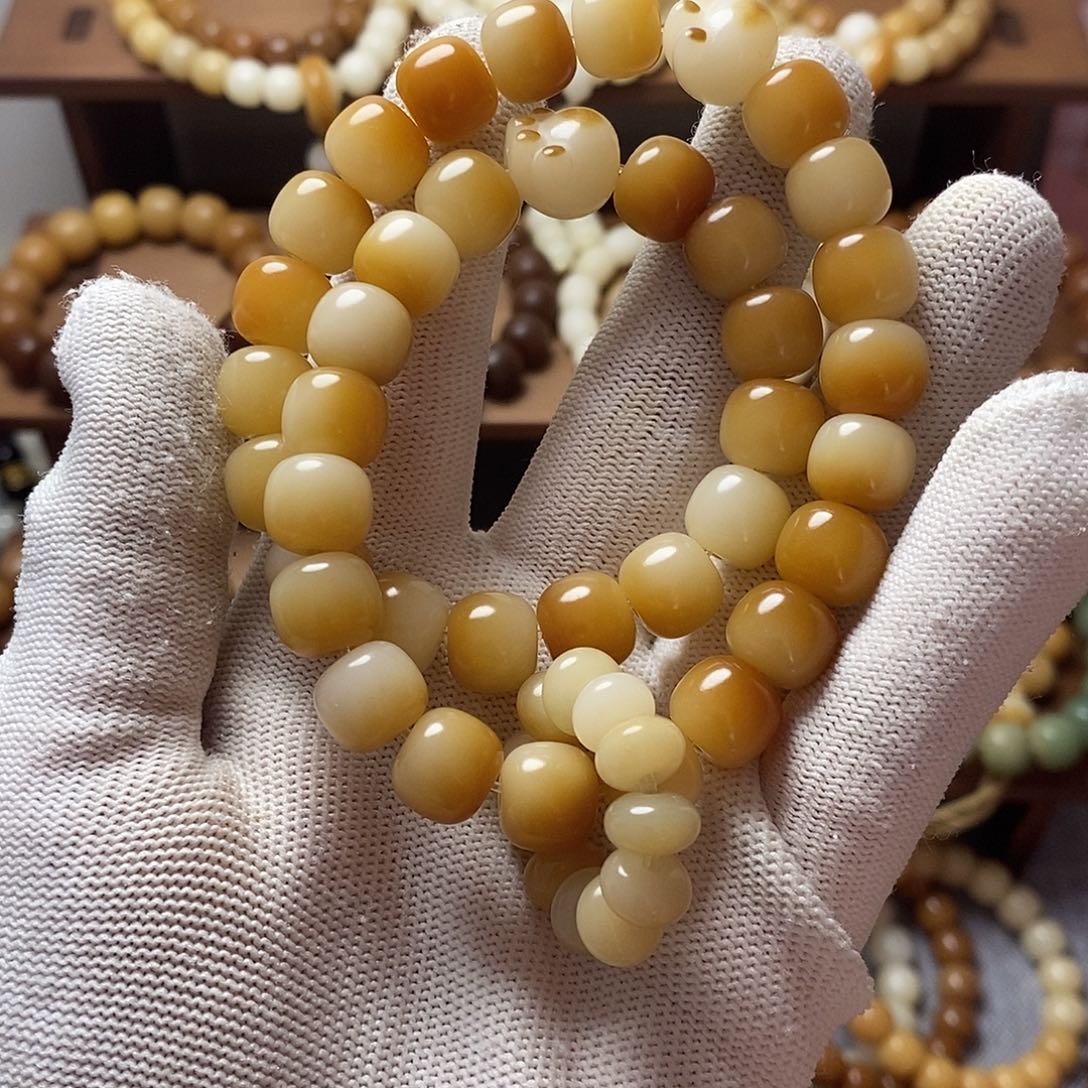 卷***人菩提籽类猫爪手持加算盘戒指跑环