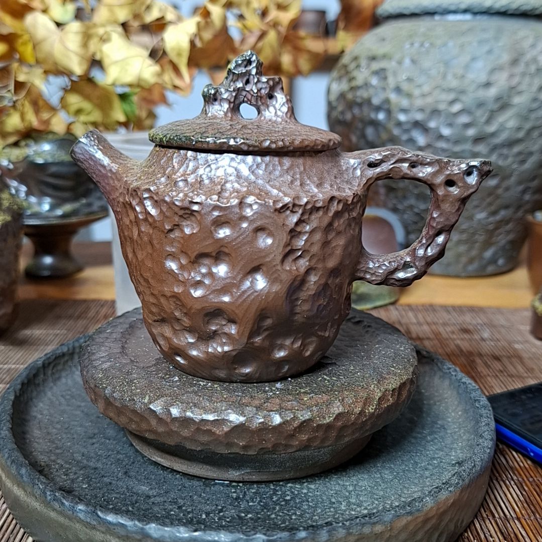 坭兴陶纯柴烧锤纹壶180c，微瑕