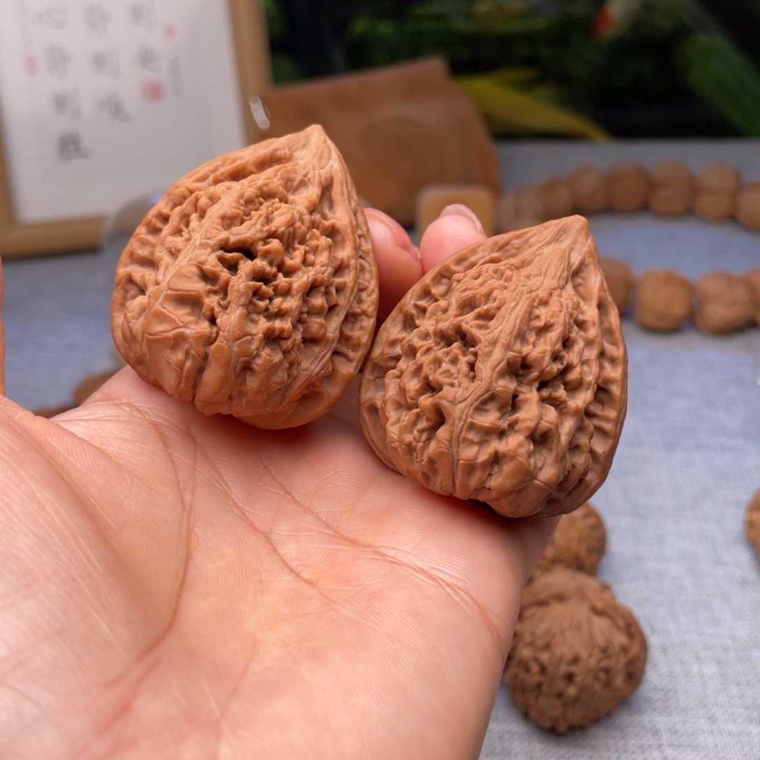 桃核把件41全品三角凤凰台