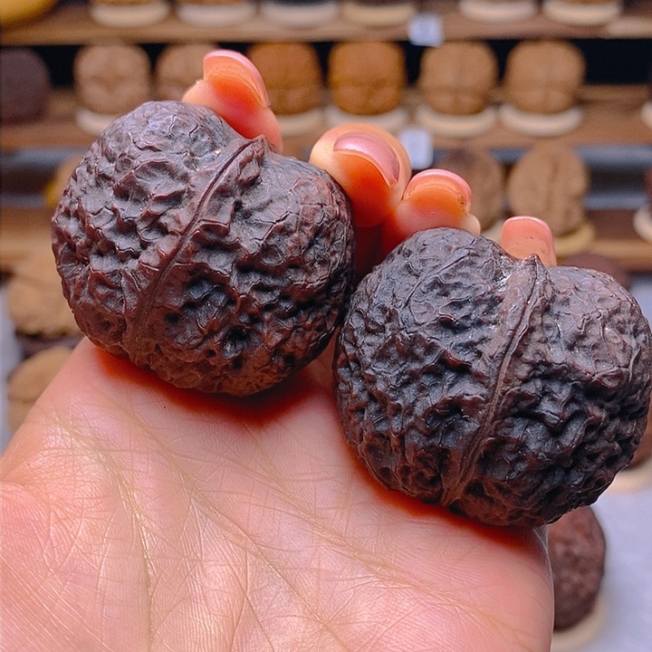 桃核把件七彩元宝43mm